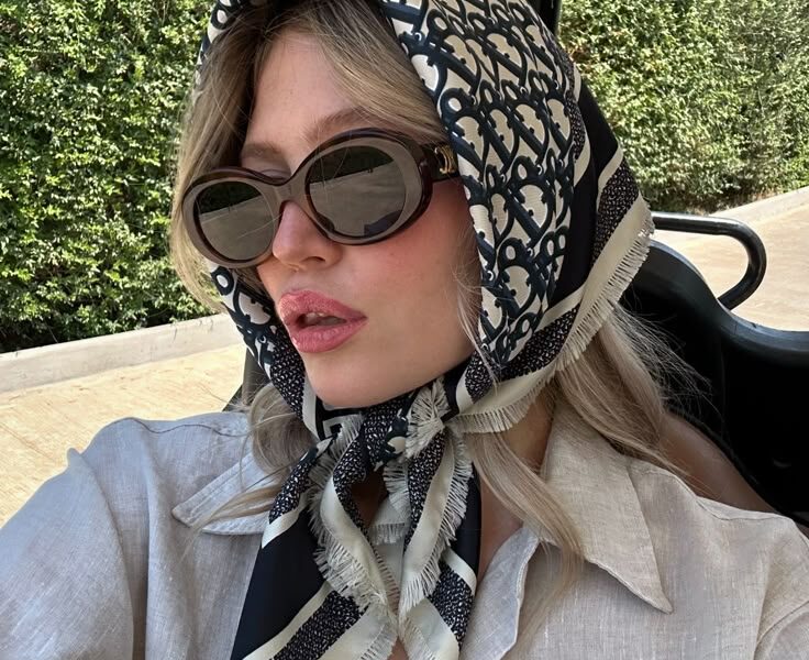 silk scarves and oversized sunglasses