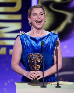 Jessie Buckley with her award among the BAFTA 2026 winners